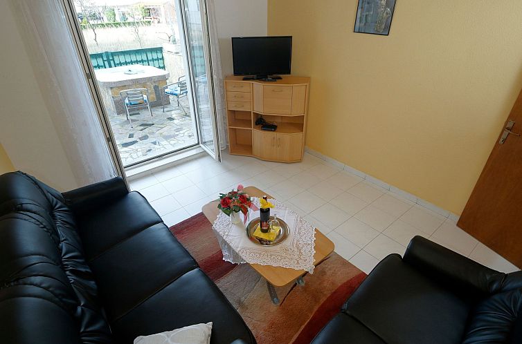 Appartement für sechs Personen mit Terrasse