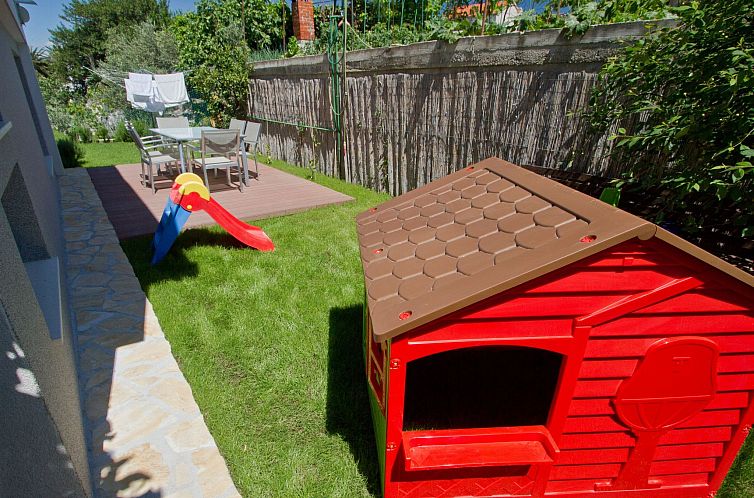 Vakantiehuis Charmantes Ferienhaus mit grünem Garten