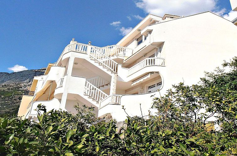 Guest house 1032914 - Apartment Dalmatia - Appartement Wohnung mit Balkon und Meerblick in Strandnähe