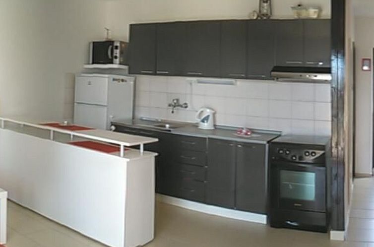 Vakantiehuis mit überdachter Terrasse und Meerblick