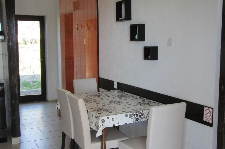 Vakantiehuis mit überdachter Terrasse und Meerblick