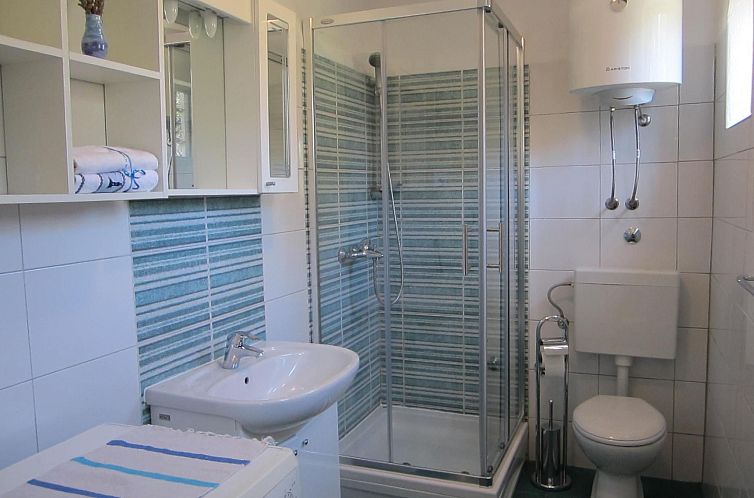 Vakantiehuis mit überdachter Terrasse und Meerblick