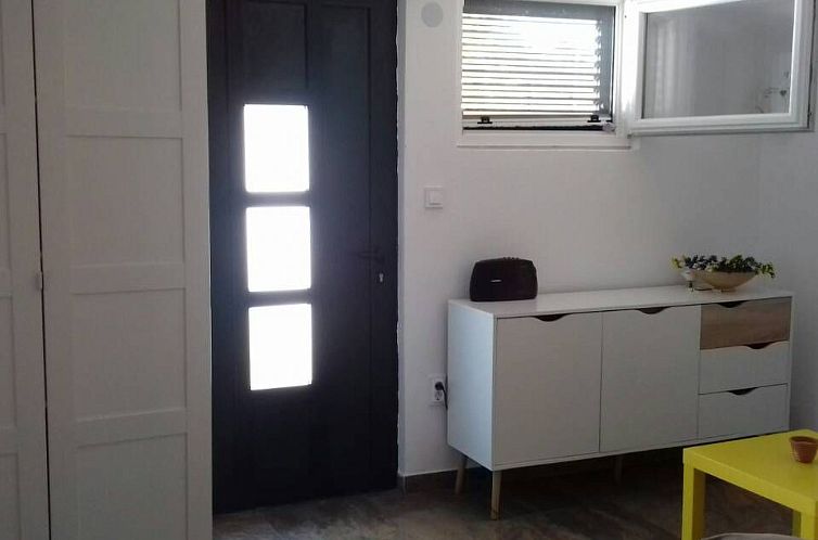 Vakantiehuis mit überdachter Terrasse und Meerblick