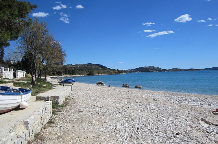 Vakantiehuis mit überdachter Terrasse und Meerblick