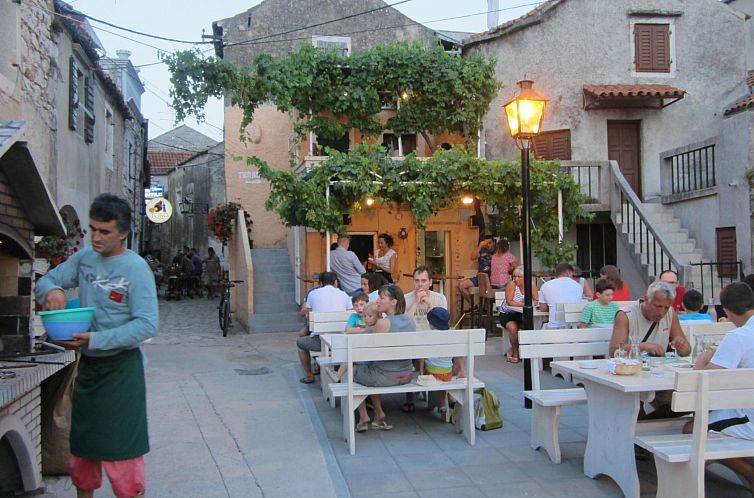 Vakantiehuis mit überdachter Terrasse und Meerblick