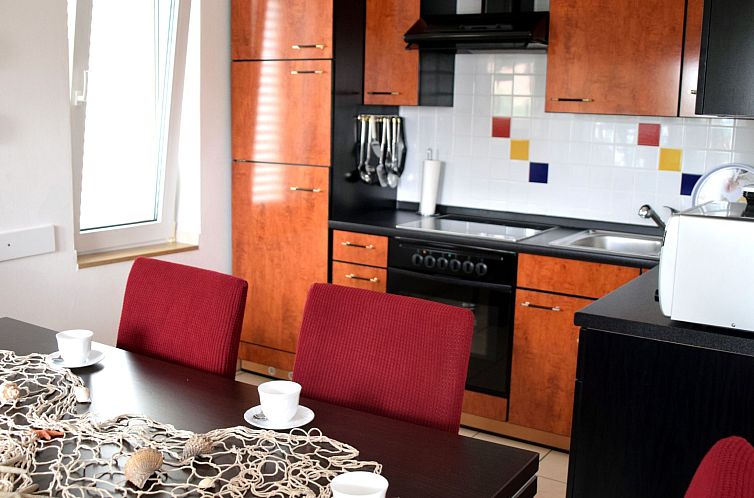 Appartement für sechs Personen mit Terrasse im Erdgeschoss 