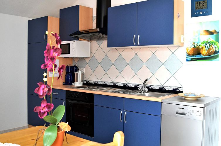 Appartement für vier Personen mit Balkon im ersten Obergesc