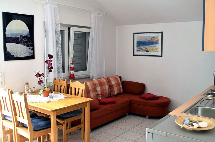 Appartement für vier Personen mit Balkon im ersten Obergesc