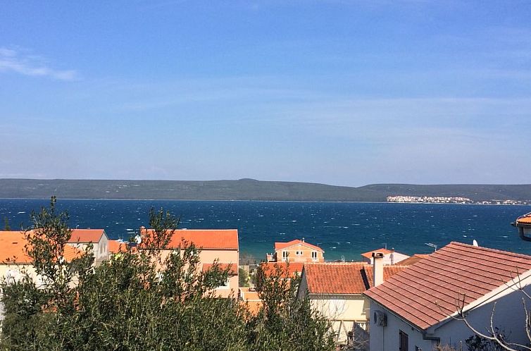 Appartement für vier Personen mit Balkon im ersten Obergesc