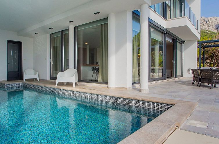 Vakantiehuis Villa Puntien am Meer mit privatem Pool