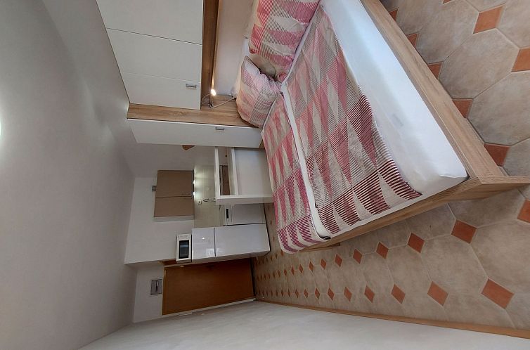 Appartement Studio mit Terrasse im ersten Stock des Hauses