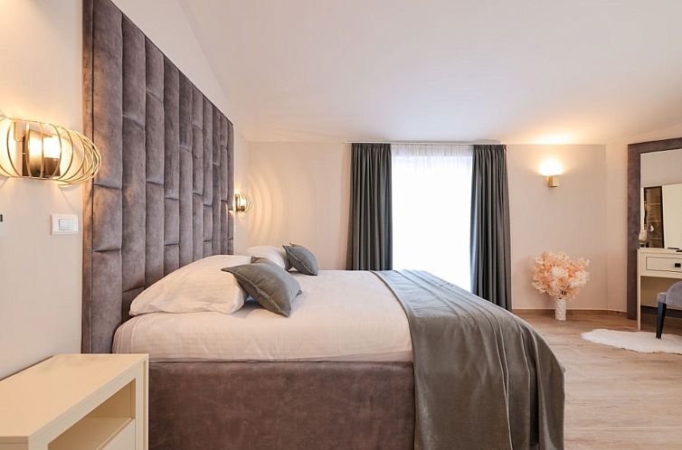 Vakantiehuis Gästezimmer "Rosa Zimmer" mit Balkon