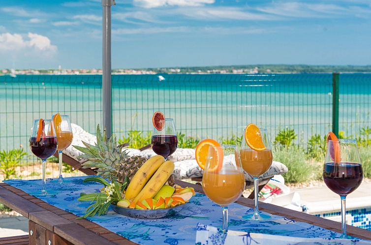 Vakantiehuis Strandvilla Miri Rose mit beheizbarem Pool