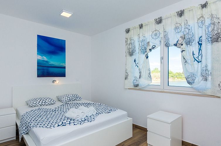 Vakantiehuis Strandvilla Miri Rose mit beheizbarem Pool