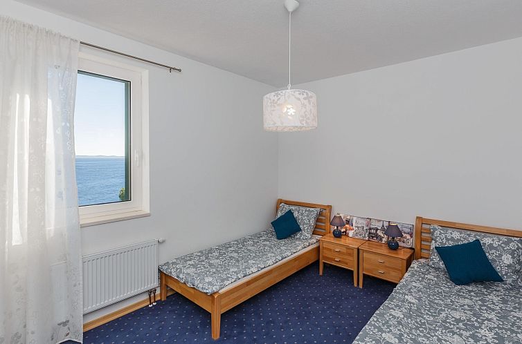 Vakantiehuis Ferienvilla "Osibova" mit Blick auf das Wasser
