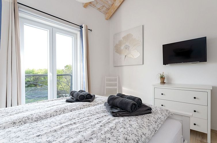 Vakantiehuis Eine luxuriöse Villa "Maslina" mit Pool und Gr
