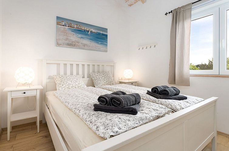 Vakantiehuis Eine luxuriöse Villa "Maslina" mit Pool und Gr
