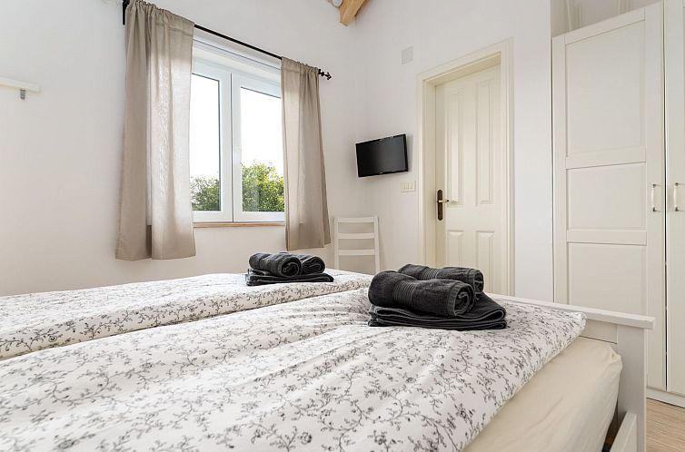 Vakantiehuis Eine luxuriöse Villa "Maslina" mit Pool und Gr