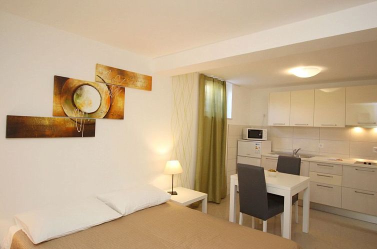 Guest house 1043974 - Apartment Kvarner - Appartement Appartement in Baška mit gemeinsamem Pool und G