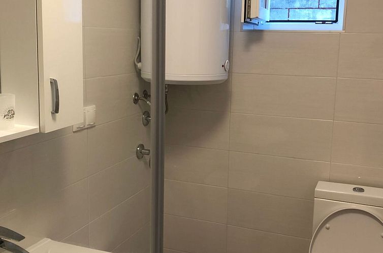 Vakantiehuis mit grünem Garten und Meerblick