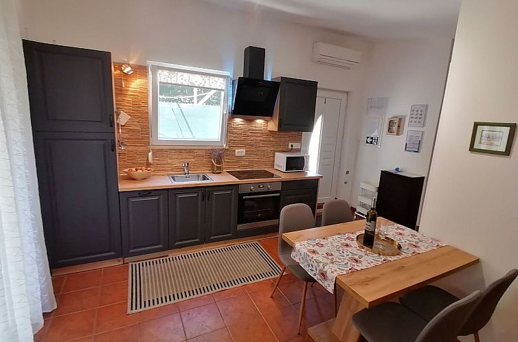 Vakantiehuis Strandnahes kleines Ferienhaus mit Terrasse