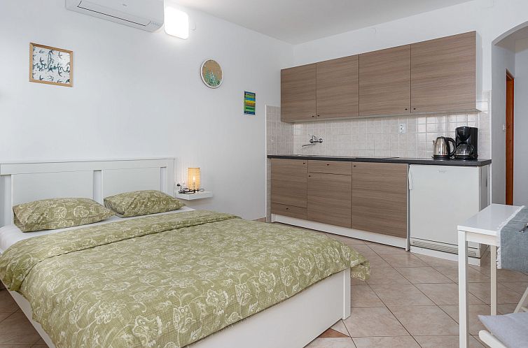 Guest house 1048139 - Apartment Kvarner - Appartement Apartment Karabaic - 1