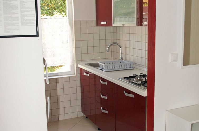 Appartement mit einer überdachten Terrasse