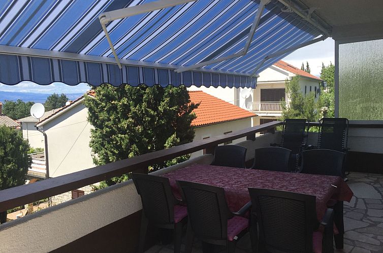 Appartement mit einer überdachten Terrasse