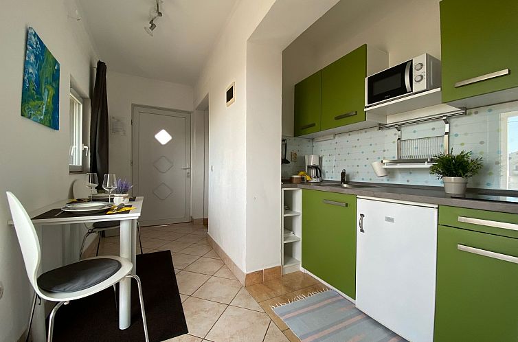 Appartement Apartment mit einem kleinen Wohn- und Essbereich