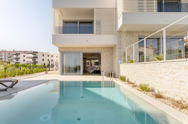 Unterkunft 1048269 - Ferienhaus Kvarner - Vakantiehuis Neue moderne Villa "Smokva 1" mit Pool