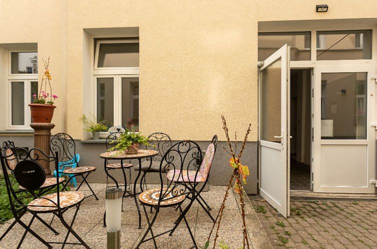 Appartement Wohnung in Fünfhaus mit Garten