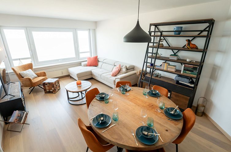 Cozy interior space of Apartment Escape with sea view in Blankenberge, Belgian coast, with stylish decor and sea view.