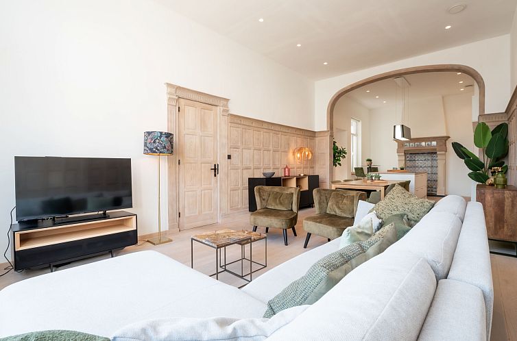 Stylish interior space of Apartment Historical and spacious 'La Tourelle I' in Blankenberge, Belgian coast, with spacious sitting area.