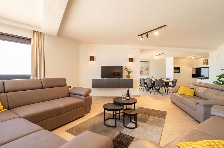 Stylish living room in Apartment Aqua Vista with sea view, Blankenberge, Belgian coast. Comfortable space for relaxation and conviviality.