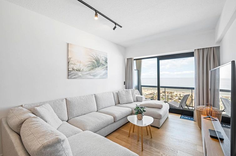 Modernes Wohnzimmer in Malibu Beach - 4A Ferienhaus mit Meerblick, Blankenberge, belgische Kueste. Gemuetliche Sitzecke und Panoramablick.