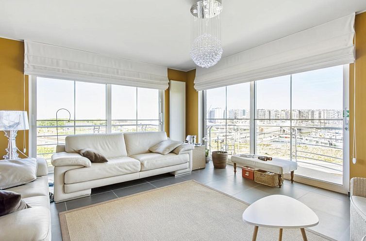 Helles Wohnzimmer in Jachthaven II - 9.0402 + Box 35, Ferienhaus in Blankenberge an der belgischen Kueste mit Blick auf den Yachthafen.
