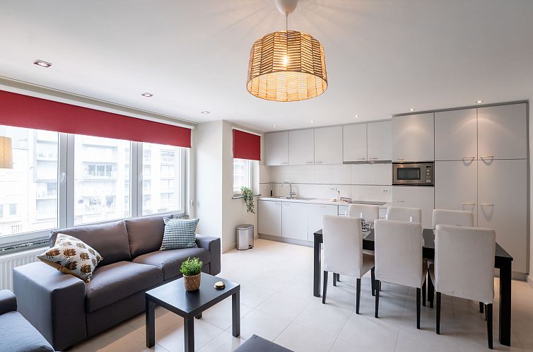 Spacious living room and kitchen in Apartment Andrei with parking in Blankenberge, Belgian coast, perfect for a relaxing vacation.