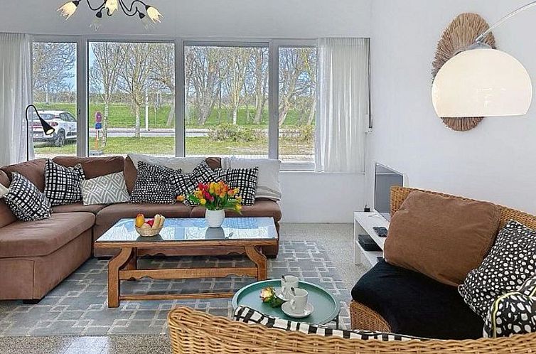 Entspannen Sie sich im Garten des Ferienhauses sea-kret in Bredene an der belgischen Kueste, ideal fuer einen ruhigen Urlaub in einem charmanten Ferienhaus.