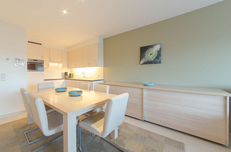 Moderne eetruimte in Appartement Seaside 4.02, Bredene, Belgische kust. Geniet van comfort en stijl in dit vakantieappartement.