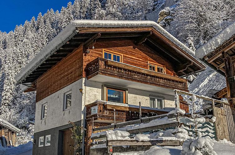 Enjoy the winter charm of Apartment Leiter, a vacation home in snowy Bramberg am Wildkogel, Salzburg.