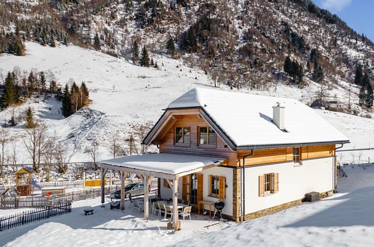 Attractive Chalet Amsel in the winter landscape of Donnersbachwald, Styria with beautiful terrace.