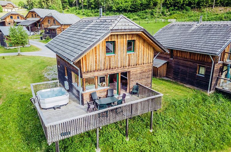 Vacation home Kreischberg W3 in Austria with veranda and jacuzzi, located in picturesque Styria.