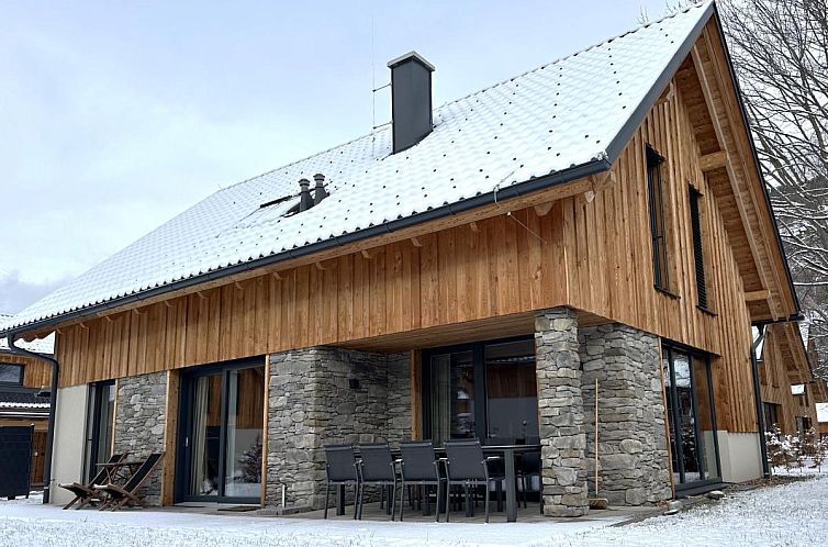 Discover the cozy Mountain Chalet Bakkershof in Kreischberg, Styria, Austria, with a beautiful terrace and winter charm.