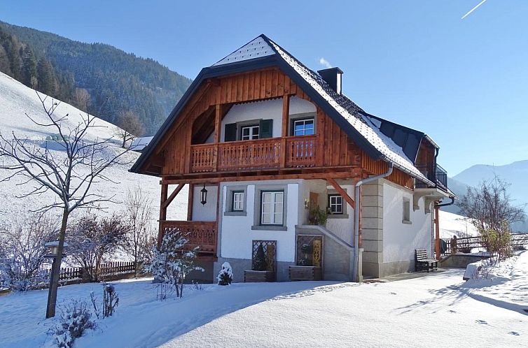 Vacation home Naturpark Chalet Schladming-Dachstein in Grosssolk, Austria, offers a charming winter atmosphere with mountain views.