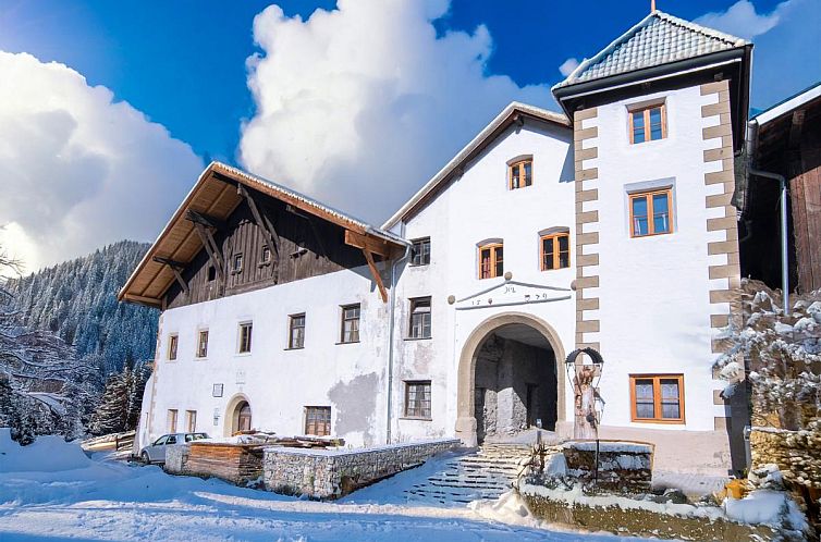 Vacation home Schloss Sissi - S in Pfunds, Tyrol, offers a winter escape with beautiful mountain views.