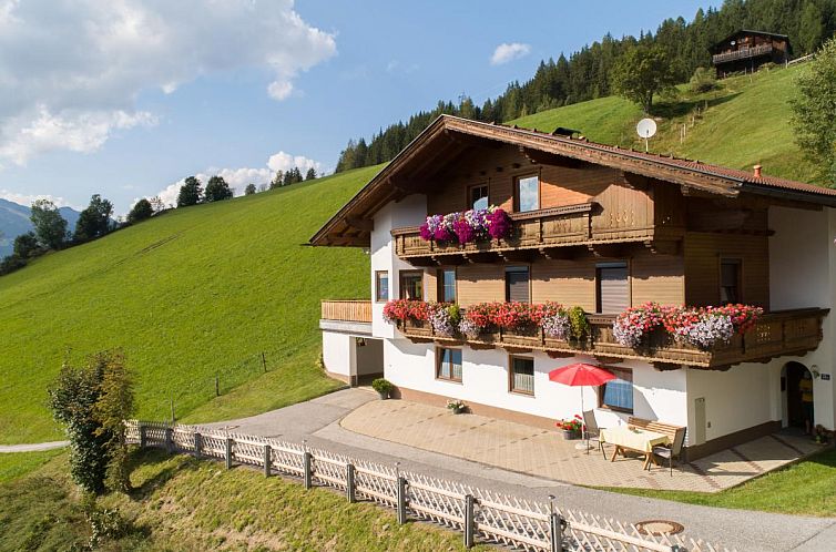 Enjoy the winter charm of Haus Sporer, a vacation home in Gerlosberg, Tyrol, surrounded by breathtaking Alpine scenery.