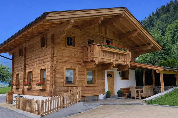 Cozy Rosalie-Lorena chalet in the winter landscape of Ramsau im Zillertal, Tyrol.