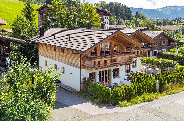 The charming Kaiserblick Gasteig vacation home in Kirchdorf in Tyrol, surrounded by winter scenery and mountains.