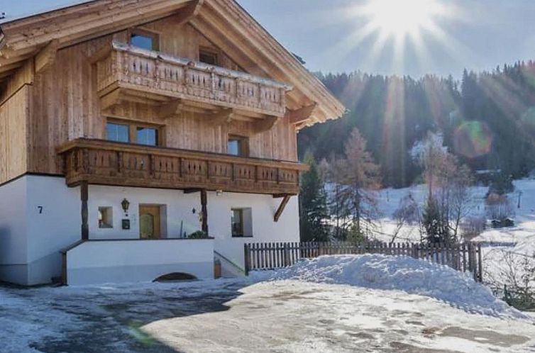 Stay at Kometer App Edelweiss, a vacation home in Fendels, Tyrol, with stunning views of snow-capped mountains and serene nature.