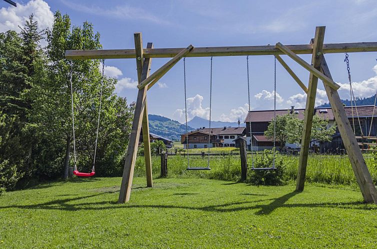 Charming Weberhof Top 4 in winter surroundings of Brixen im Thale, Tyrol, ideal vacation home.